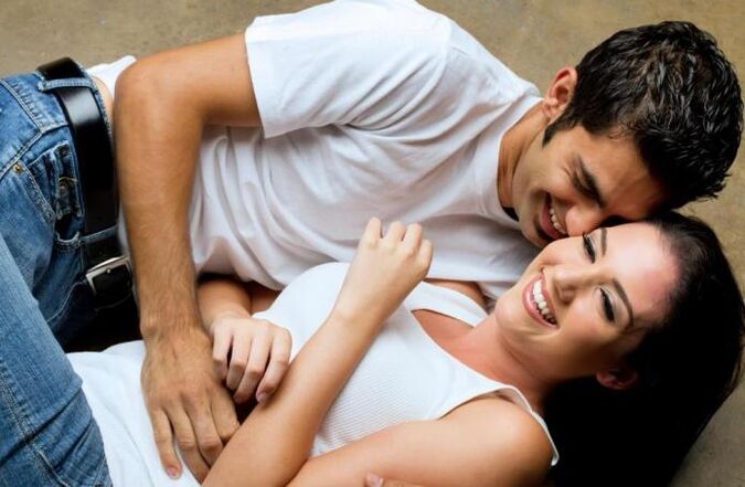 A guy is excited by touching a girl